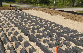 Leaching field being installed on a new home construction site