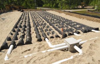 Leaching field being installed on a new home construction site