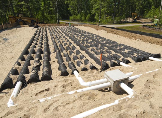 Leaching field being installed on a new home construction site