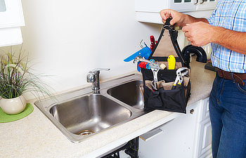 plumber on the kitchen